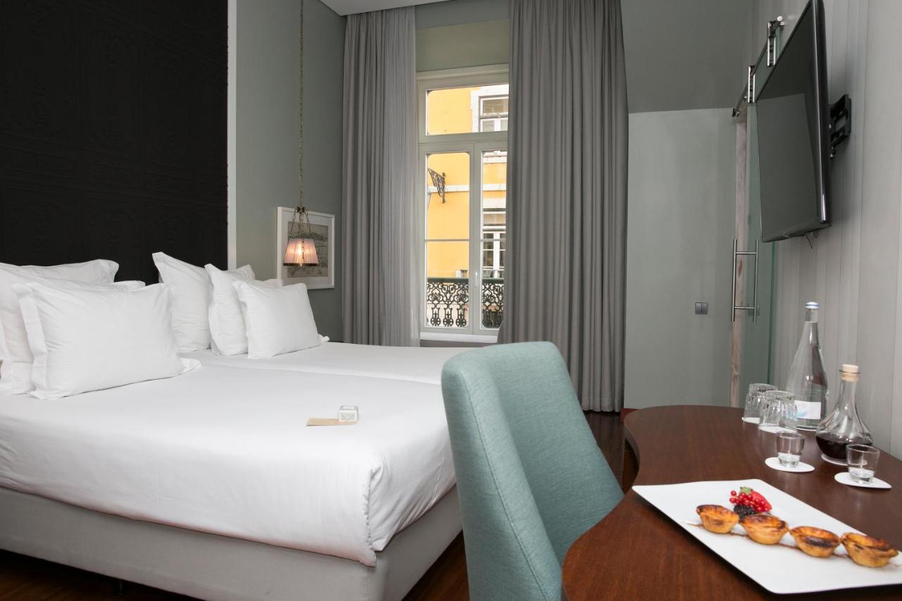 Pousada de Lisboa Praça do Comércio - Small Luxury Hoteles of the World Exterior foto A room at the hotel